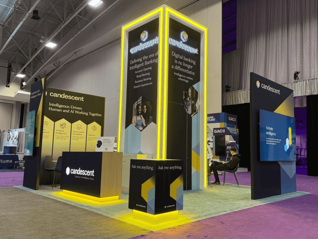 Southall and Rush booth at a trade show with digital banking displays.
