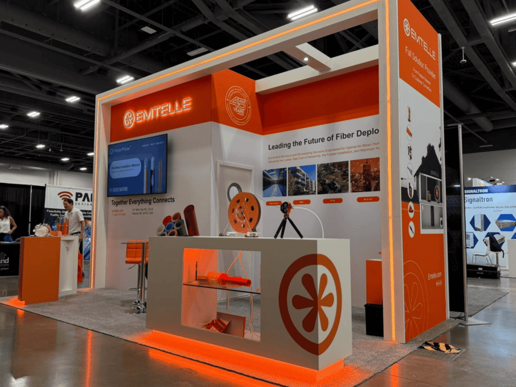 Southall and Rush exhibition booth showcasing fiber deployment solutions.